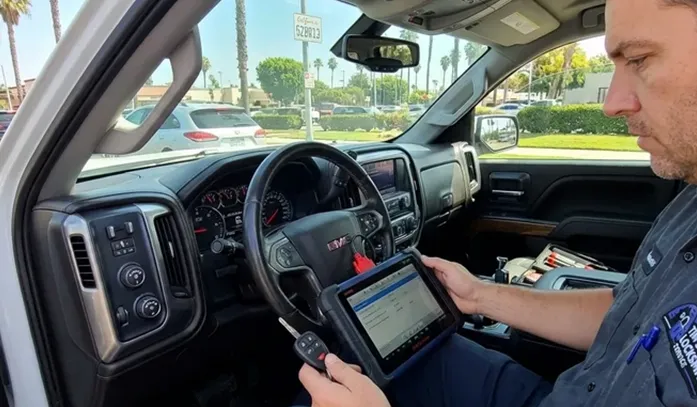 Mobile locksmith providing automotive locksmith services service