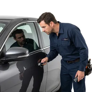 Remote fob being paired to a daily driver as a replacement for a faded remote at a customer's driveway in Coronado, California. Mobile service runs to the vehicle instead of the vehicle coming in.