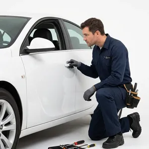 OEM transponder key being flashed into a vehicle's ECU to add a second key to the household at a dealership adjacent lot in Santee, California. Broken key extraction paired with a replacement cut on the same call.