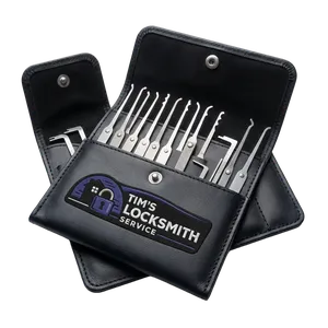 Lock pick set laid out during a front door lockout when a car key was left in the ignition with the door locked at a Imperial Beach, California address. Automotive lockout kits handle modern and legacy vehicle doors.