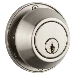 Tim's Locksmith technician swapping the key pattern on a deadbolt after a home purchase closed escrow on a front door in Otay Mesa, California. No lock replacement needed when rekeying is an option.