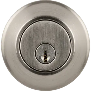 Fresh key code being cut into an existing deadbolt during a rental turnover at a home in Westlake Village, California. Typical turnaround on a single-door rekey runs about 20 minutes.