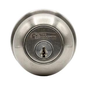 A deadbolt replacement job on a weathered entry door ahead of a new homeowner move-in at a Montecito, California property. Handleset installs paired with matching deadbolt for a uniform look.