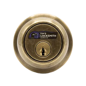 A deadbolt replacement job on a weathered entry door during a smart lock conversion from keyed hardware for a homeowner in Ojai, California. Deadbolts, smart locks, and handlesets installed on front doors, side gates, and garage entries.