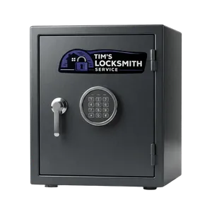 Home safe dial being manipulated open after a lost combination after a battery failure on an electronic safe for a National City, California property owner. Gun safes reprogrammed under California storage rules.